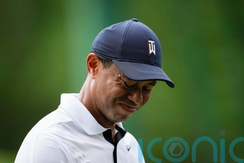 Tiger Woods makes slow start in his 25th Masters and Jon Rahm launches fightback