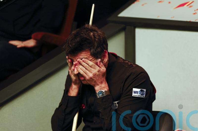 Ronnie O’Sullivan pegged back by qualifier Pang Junxu in Sheffield