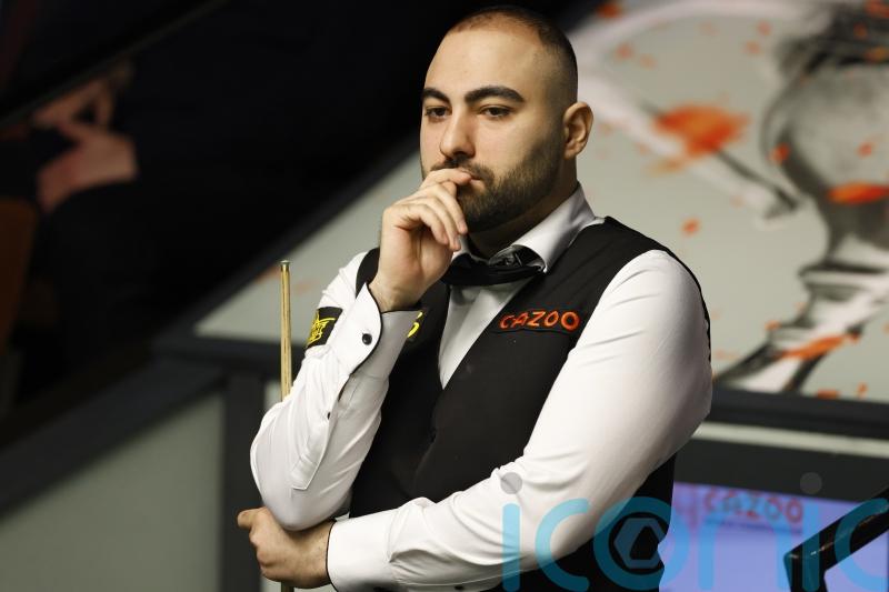 Hossein Vafaei storms past Ding Junhui to set up Ronnie O’Sullivan showdown