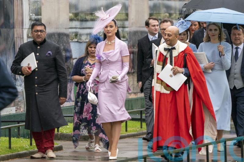 Katy Perry and Dame Emma Thompson lead fashionable arrivals to the coronation