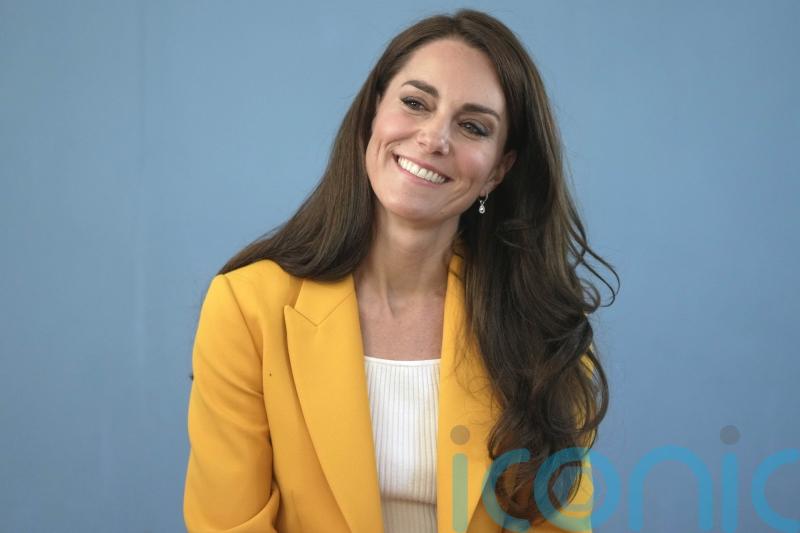 Kate debuts sunshine yellow jacket during visit to Bath