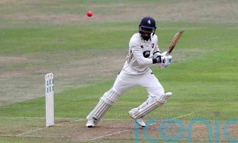 Surrey face battle to save perfect start to title defence as Kent build big lead