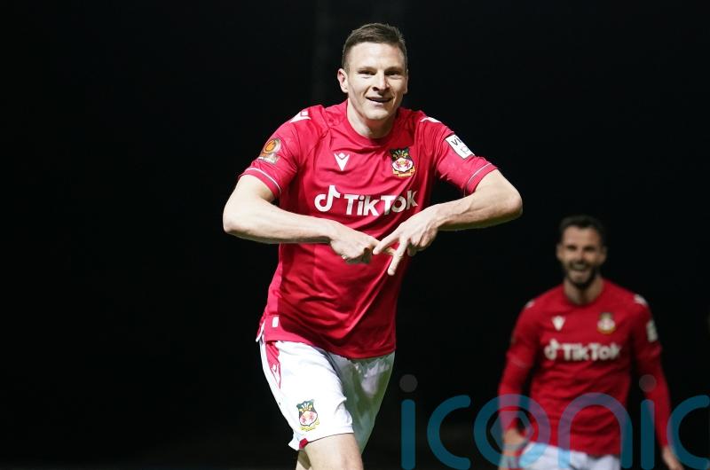 Rob Page says Wrexham’s Paul Mullin must prove himself in EFL to earn Wales call