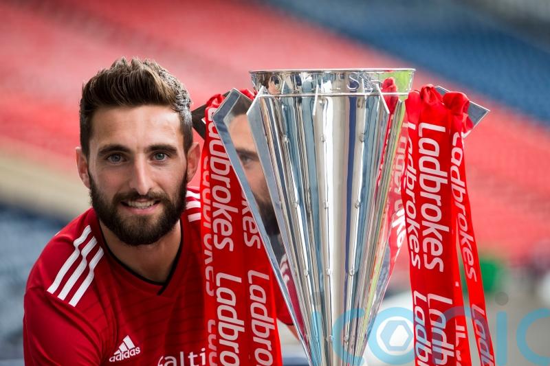 Graeme Shinnie ‘back home again’ after returning to Aberdeen on three-year deal