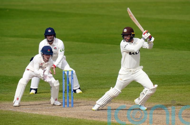 Surrey stay on course for another title with commanding win over Warwickshire