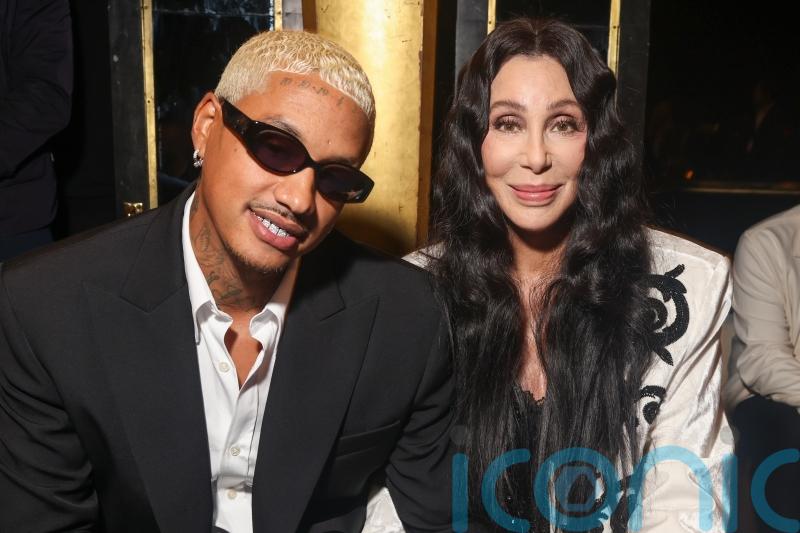 See Cher and Kim Cattrall in power outfits for Balmain fashion show