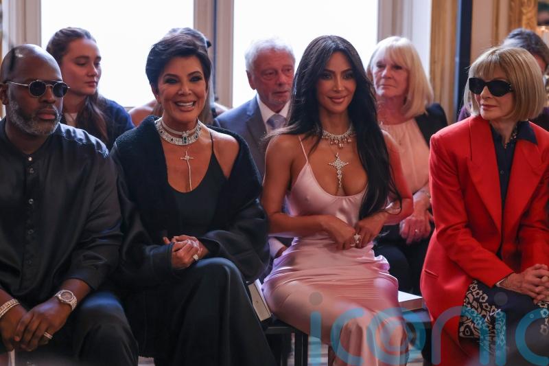 Kim Kardashian and Beckhams on front row as Victoria unveils latest collection