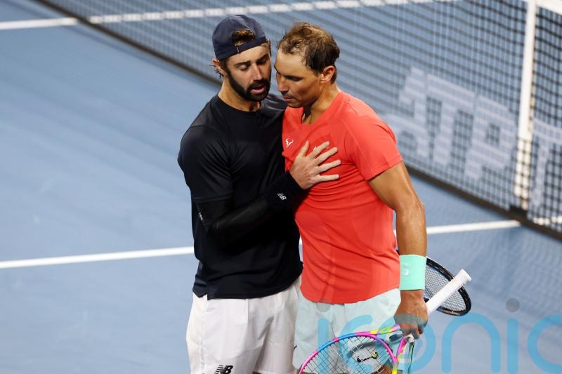 Rafael Nadal hoping to play Australian Open after hip issue in Brisbane