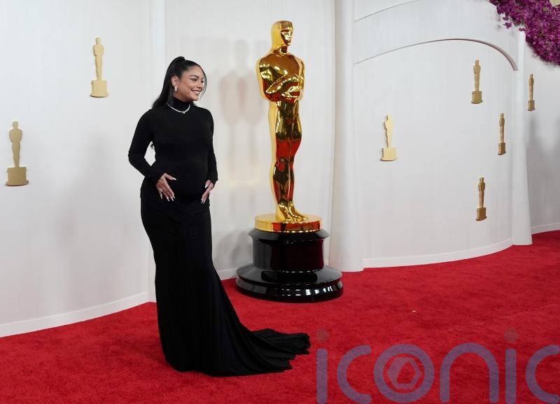 Pregnant Vanessa Hudgens sets early all-black fashion trend at the Oscars