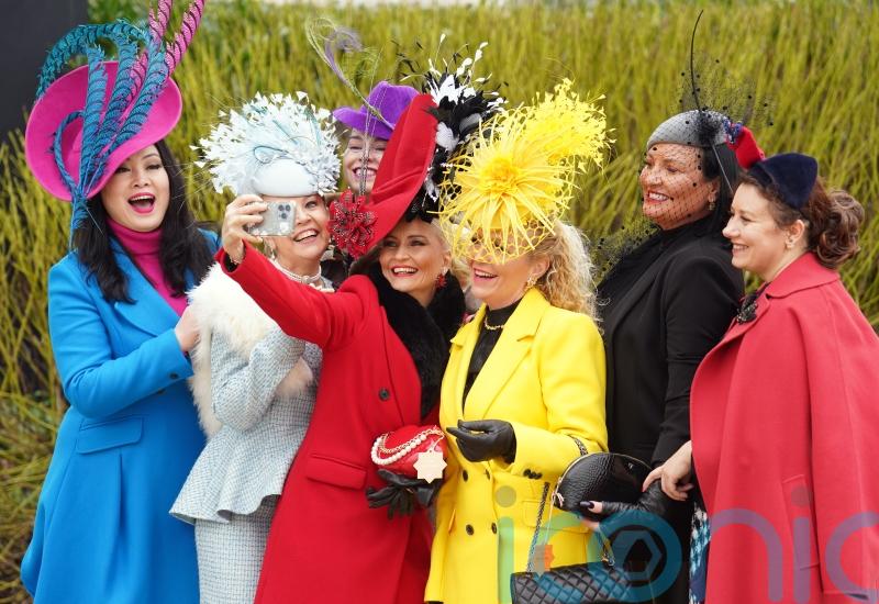 Bright colours and extravagant hats take over Cheltenham Festival fashion