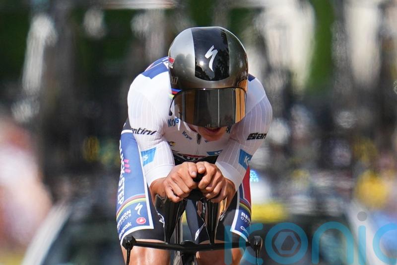 Remco Evenepoel survives late scare to win Tour de France stage seven time trial