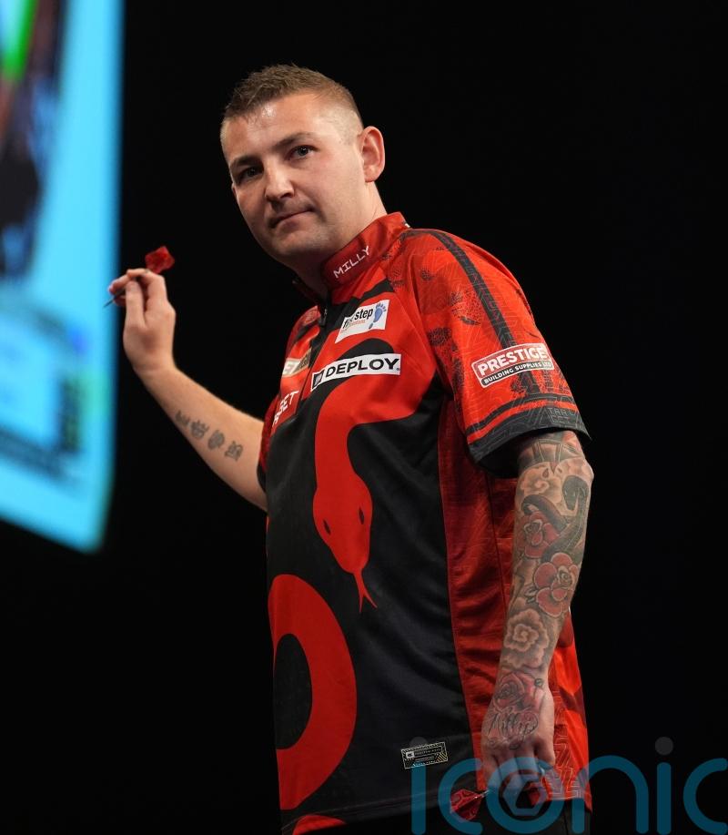 James Wade brings early end to Nathan Aspinall’s title defence