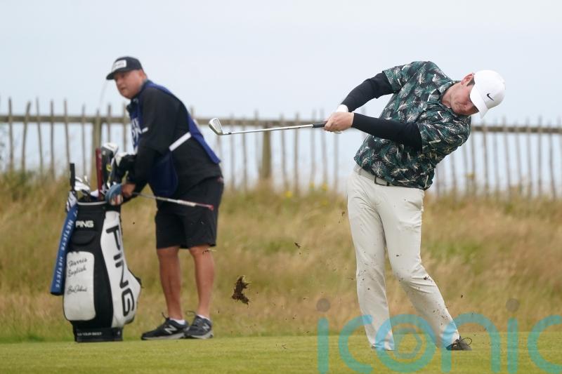 Early starters take advantage of favourable conditions at Open
