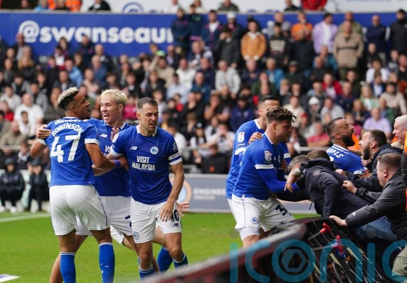 Callum Robinson’s late equaliser earns Cardiff a point in derby at Swansea