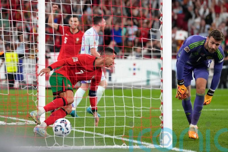 Cristiano Ronaldo’s late winner breaks Scotland resistance in Lisbon