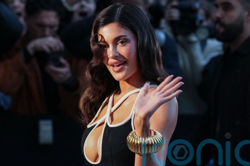 Kylie Jenner turns out to support sister Kendall in Schiaparelli runway