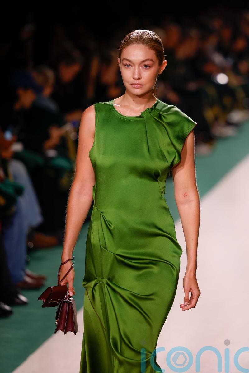 Victoria Beckham pays homage to Keira Knightley’s green Atonement dress at Paris Fashion Week