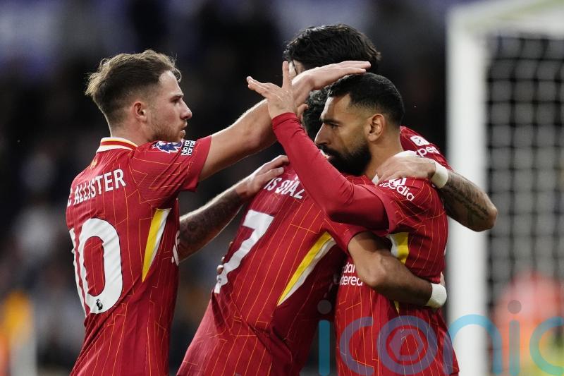 Liverpool go top of the Premier League after win at Wolves