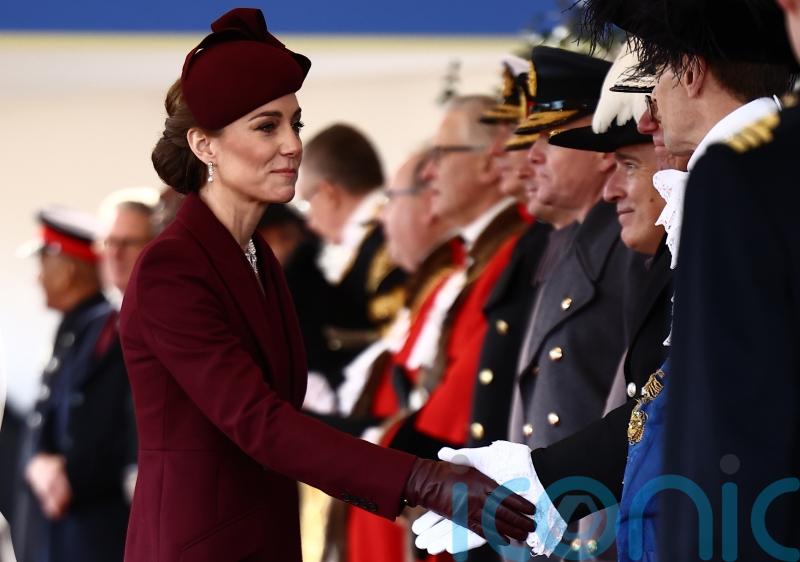 Kate pays tribute to the late Queen in burgundy ensemble for Qatar state visit