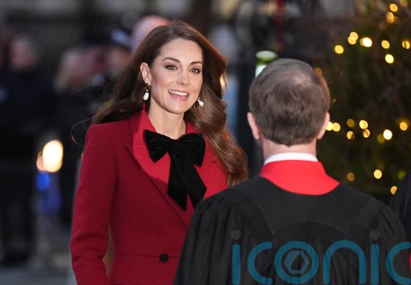 Kate sports festive bow ensemble at Christmas carol service