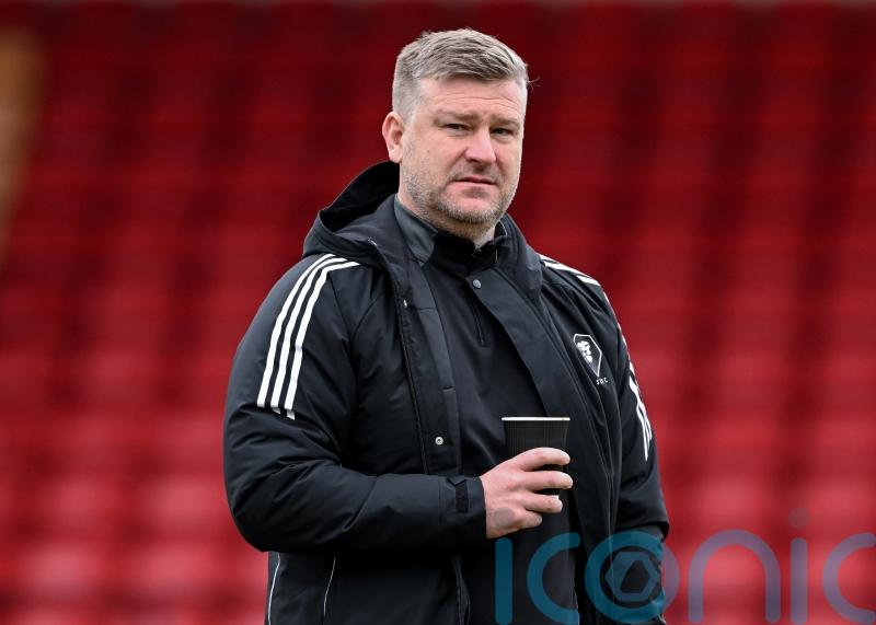 Karl Robinson claims way referee spoke to him after Salford defeat ‘a disgrace’