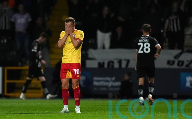 Grimsby slip out of League Two play-off places after goalless draw at MK Dons