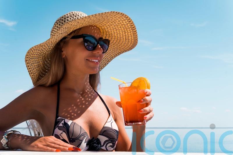5 ways the mix of sun and alcohol can impact your health