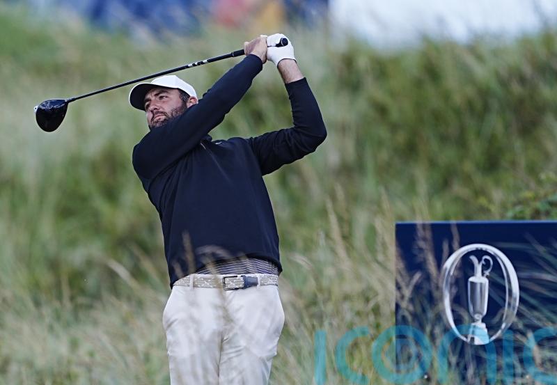 Scottie Scheffler takes grip of Open as Rory McIlroy charges up leaderboard