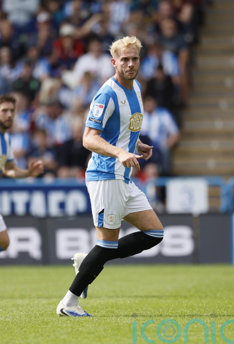 Jack Whatmough and Cameron Ashia continue Huddersfield’s winning start
