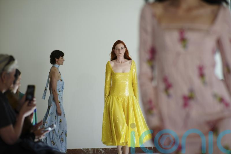 Royal favourite Emilia Wickstead trades demure daywear for bold colour and balloon hems