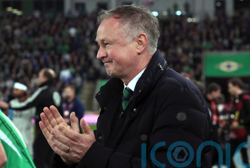 Michael O’Neill enjoys joke about long-ball tactics after narrow Germany defeat