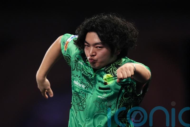 Motomu Sakai struts his stuff before cruising through at Alexandra Palace