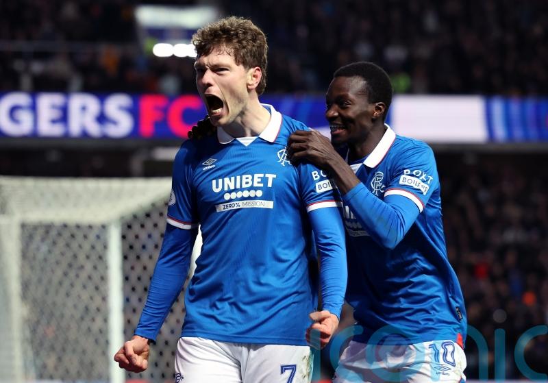 Rangers close gap on leaders Hearts with victory over 10-man Kilmarnock