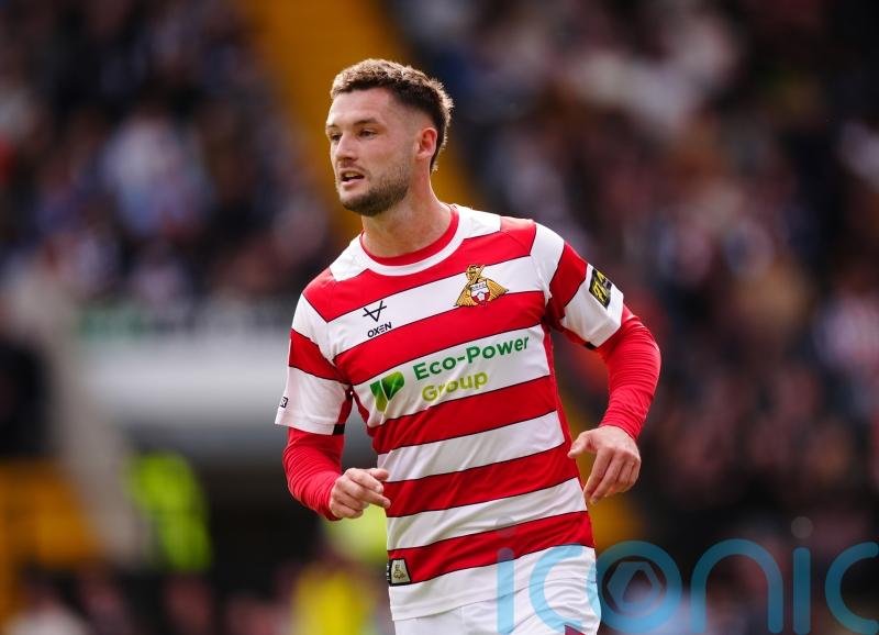 Luke Molyneux on the spot as Doncaster edge out Huddersfield