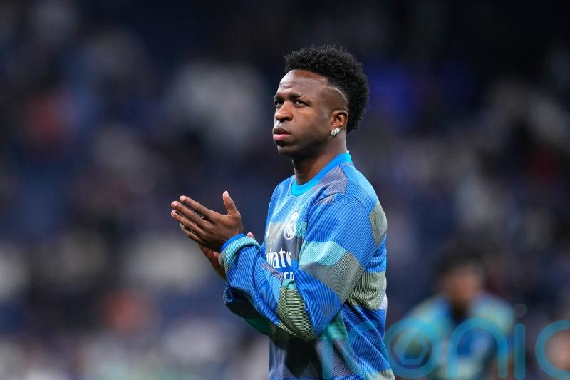 Real Madrid fans unveil banners supporting Vinicius ahead of Benfica second leg