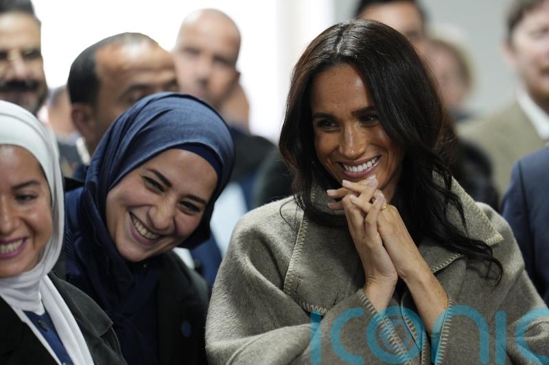 Meghan opts for Zara style staples on her trip to Jordan with Harry