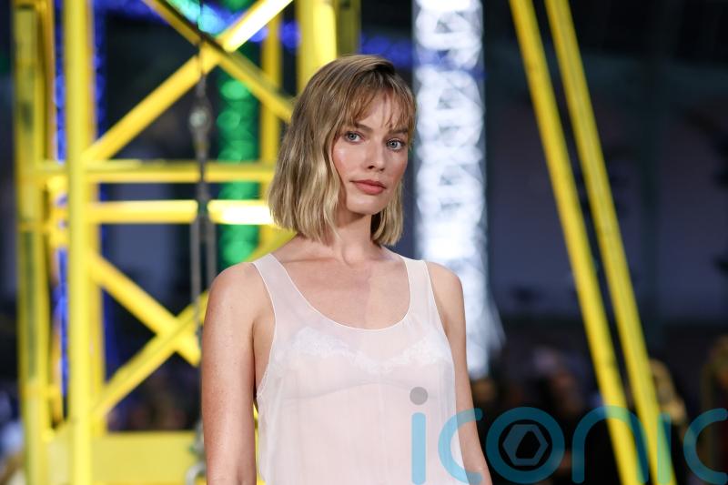 Margot Robbie debuts new haircut as stars attend Chanel show at Paris Fashion Week