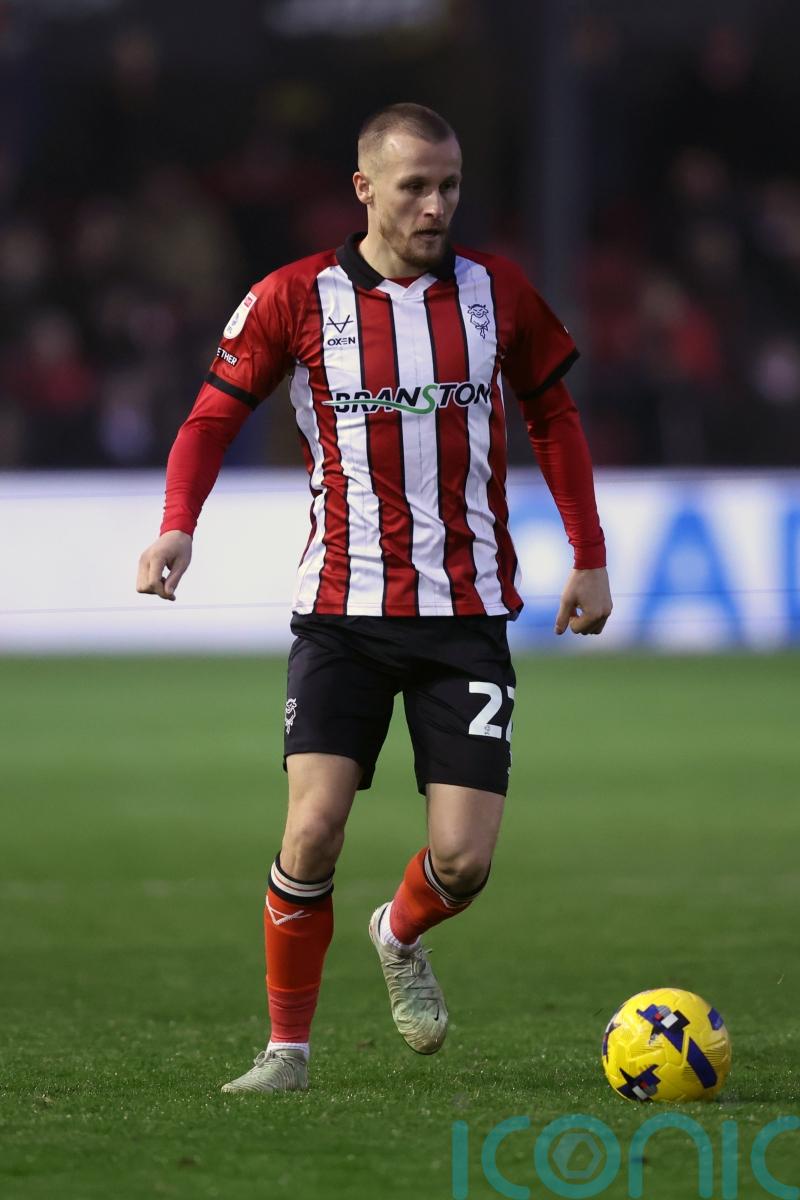 Lincoln extend unbeaten league run to 19 with victory at Exeter