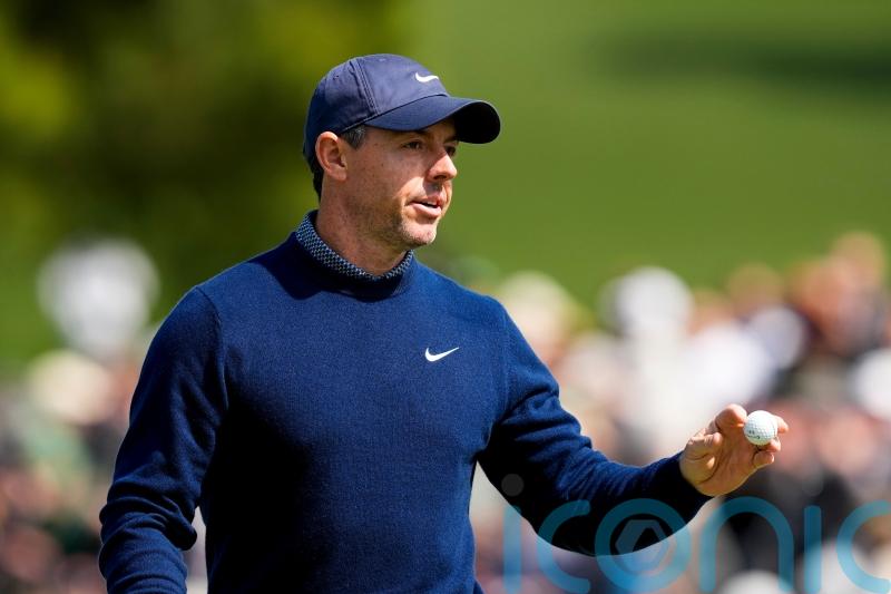 Rory McIlroy claims share of lead in hunt for back-to-back Masters victories
