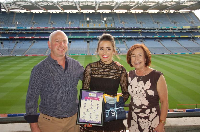 Offaly's Ellee McEvoy with her parents at the Team of the League Awards in Croke Park