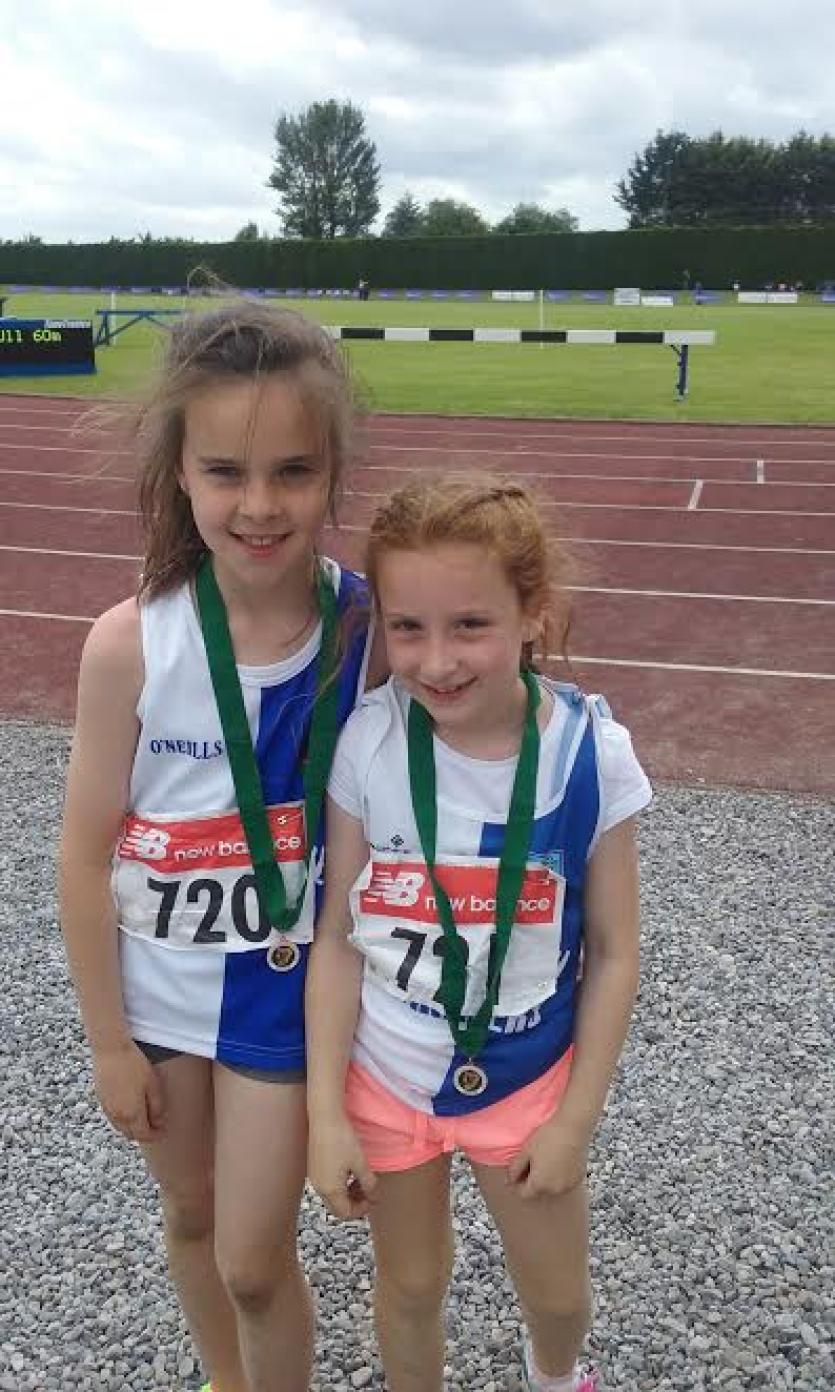 Lily Grennan and Anna Mc Greal taking bronze medals in the pairs 60 metres and long jump.