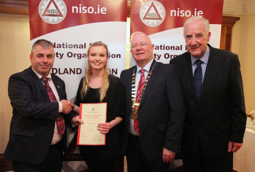 Lorna Clarke, Edenderry receives her award from Minister of State Kevin Moran