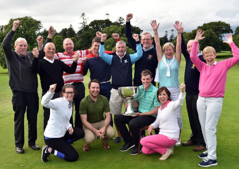Members of Tullamore Golf Club celebrate with Stuart Grehan