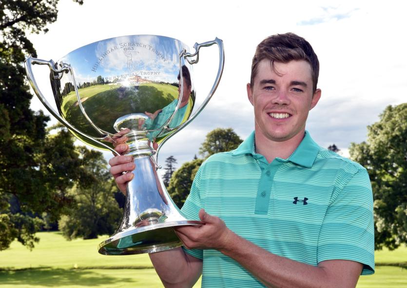 Stuart Grehan lifts the Mullingar Scratch Trophy