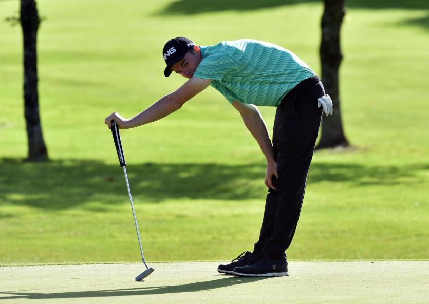 Stuart Grehan agonises over a putt during the Mullingar Scratch 2017