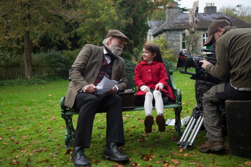 Degnan and Isabel share a joke during filming
