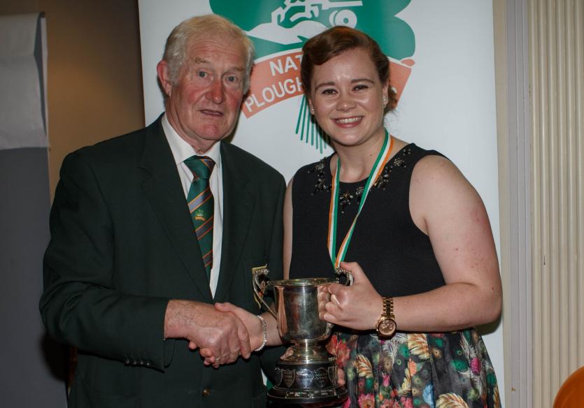 Laura Grant is awarded bronze after her performance in the Farmerette Class by NPA President James Sutton