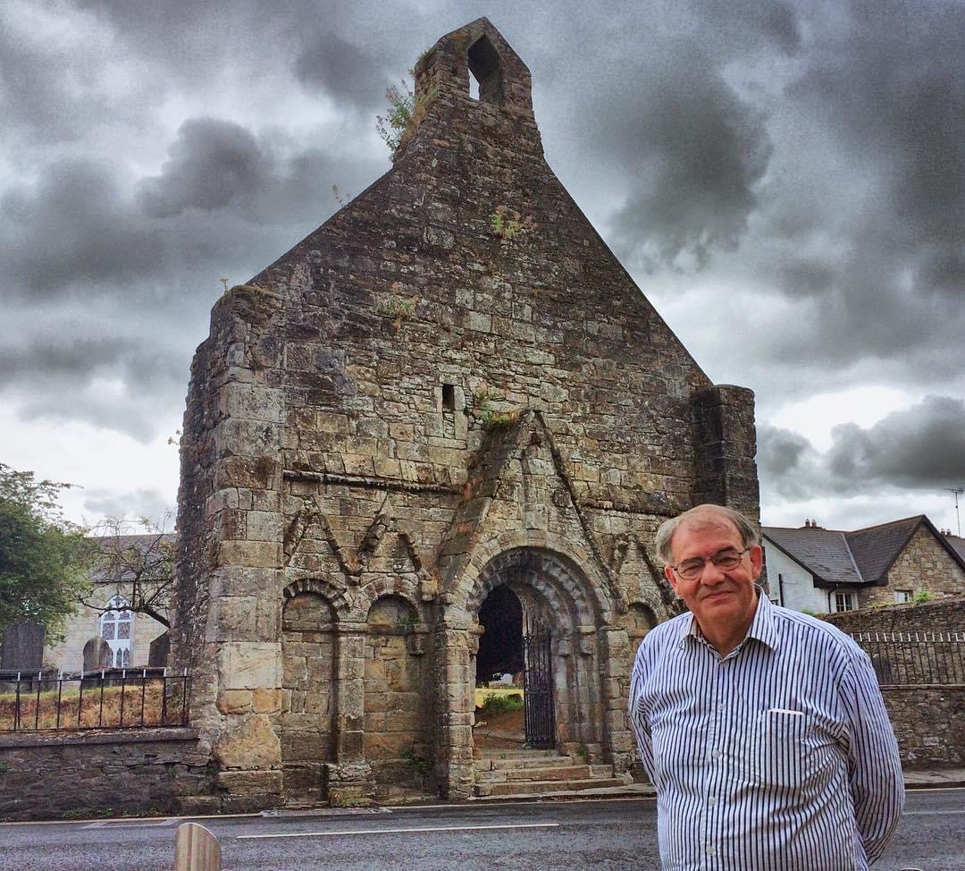 Adrian pictured at  the west gable of St Cronan's 12th century romanesque church in Roscrea. Photo: D. Keegan